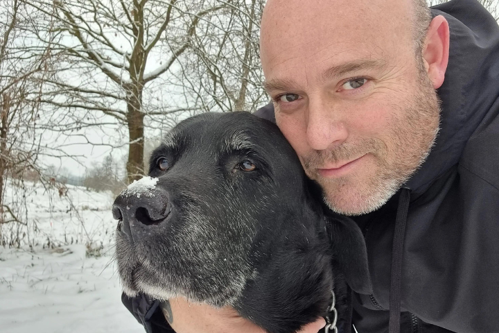 Paul and his dog out in the snow