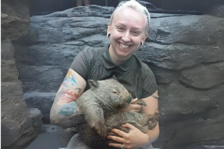 Sam holding a baby koala bear