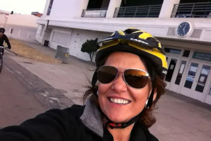 Silvia outdoors wearing a bike helmet