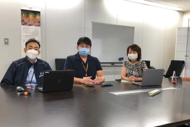 Yuko with 2 colleagues in the office wearing face masks