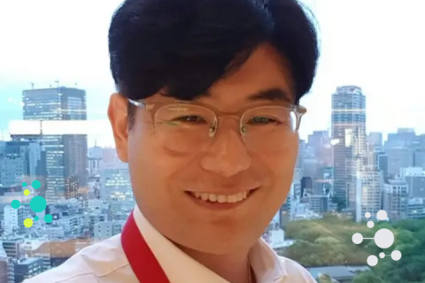 a selfie of Andrew and Singapore skyline in the background