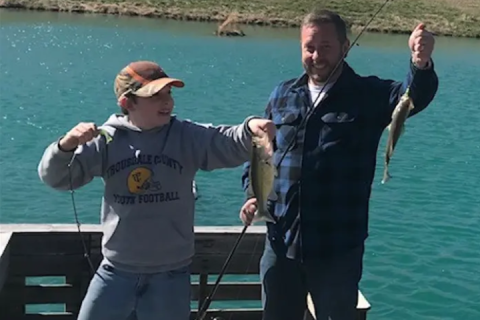 Jeff and his son fishing